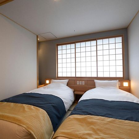 מלון Kyoto Umekoji Kadensho מראה חיצוני תמונה A room at the hotel